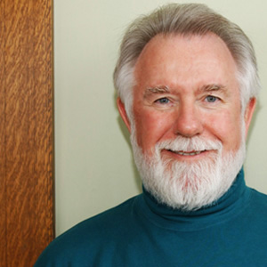 Portrait of Alvy Ray Smith, a bearded man.