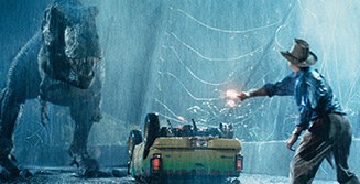 A Tyrannosaurus rex at night in the rain.