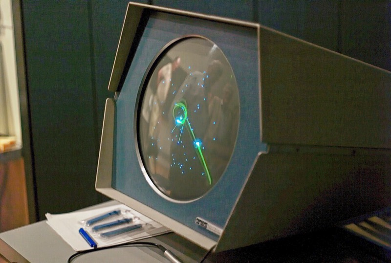 The restored PDP-1 at the Computer History Museum with Spacewar! on its round Type 30 display.
