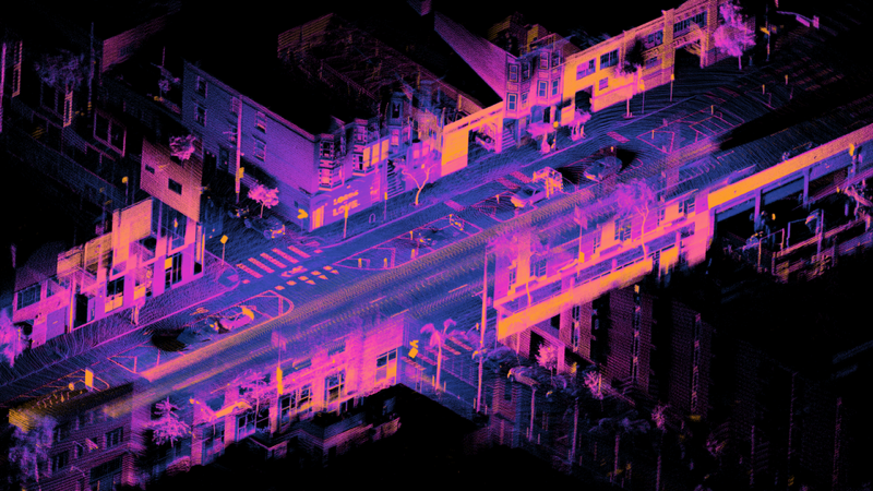 A lidar point cloud of a San Francisco street intersection: buildings, cars and road as colored points.